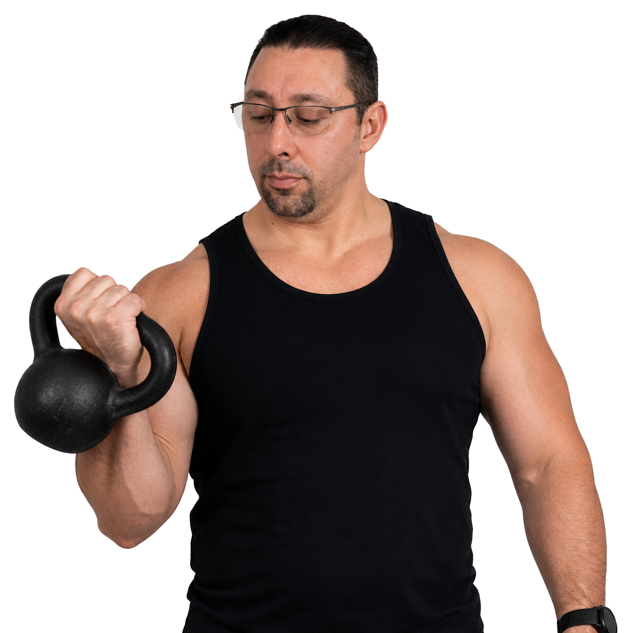 Coach Lewis Mendez holding a kettlebell
